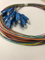 پیگتیل فیبرنوری 12 رنگ  SM SC/UPC 0.9mm 1.5M G.657A1  CC  
